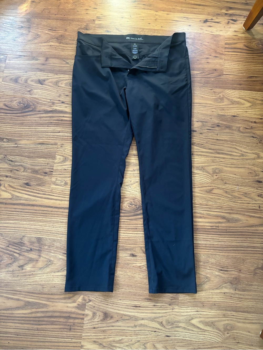 Black Travis Mather golf pant